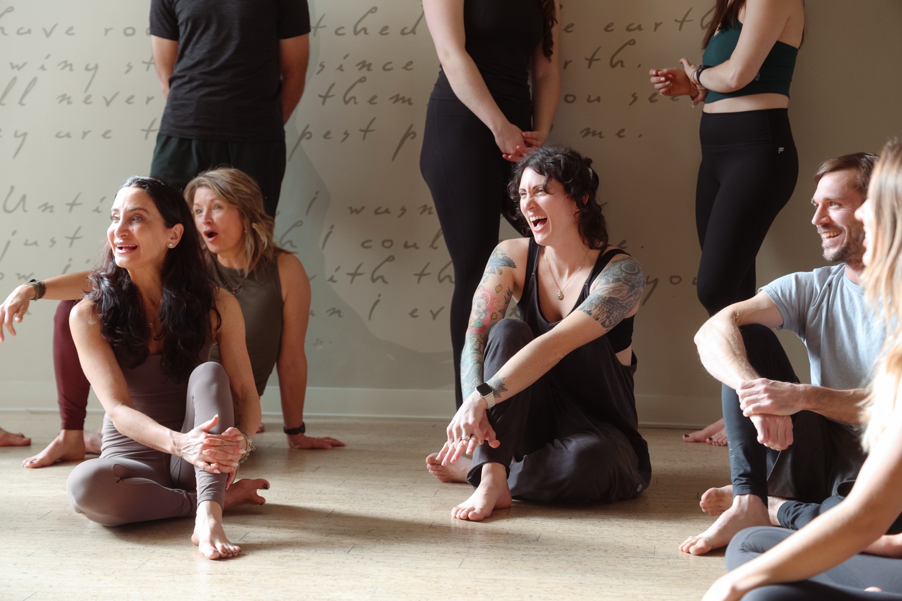 Yoga Roots teachers and students sharing a joyful moment